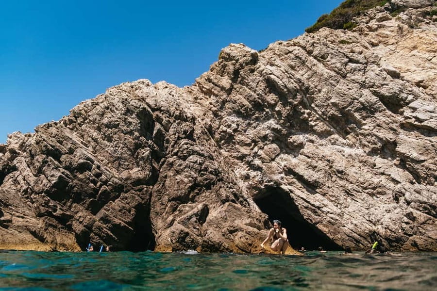 Dubrovnik: Blue Cave and Elafit Small Group Boat Exploration - Stop 1: Blue Cave glow, snorkeling time, and handling the crowd factor