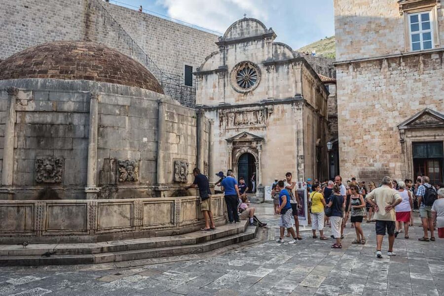 Dubrovnik: City Walls, Old Town Walking Tour & Adriatic View - Franciscan Monastery, the oldest operating pharmacy, and why it’s special