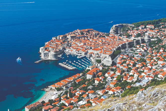 Dubrovnik Panorama Sightseeing with Tour Guide in Minivan - Amerling Fountain and the Tudman Bridge: Orientation in Minutes