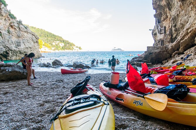 Dubrovnik Sea Kayaking Sunset Paddle - Betina Cave beach: snorkeling, optional cliff jumping, and a real hidden-access feeling