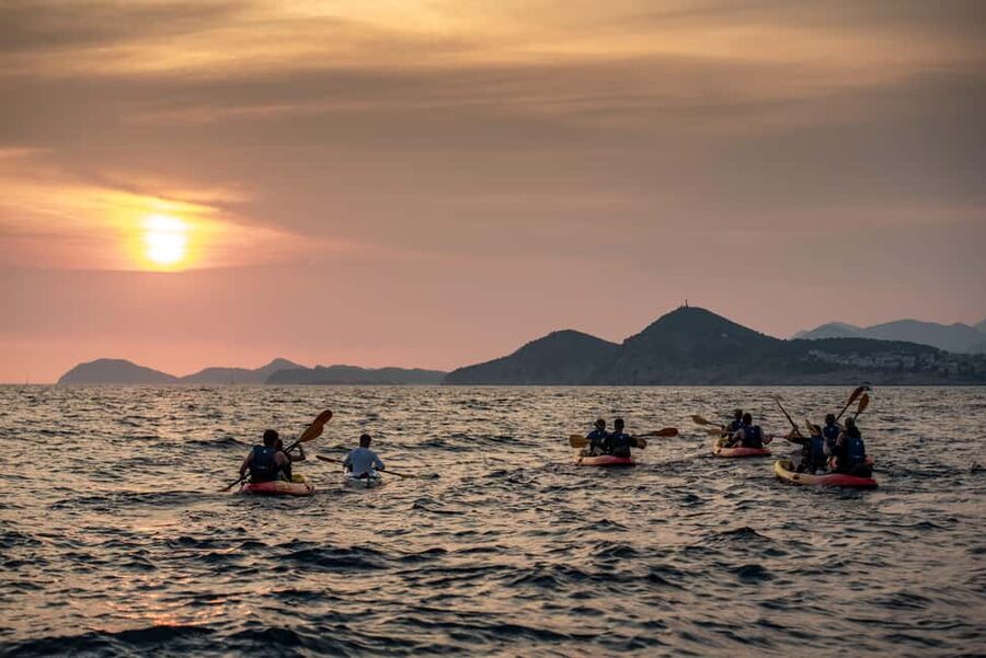 Dubrovnik: Sunset Kayaking and Snorkeling Tour - Paddling Dubrovnik’s city walls from the sea: the view you came for