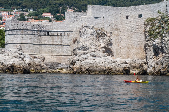 Dubrovnik: Sunset Kayaking & Snorkeling with water &wine - The Betina Cave snorkeling break: what to expect at the rocky swim spots