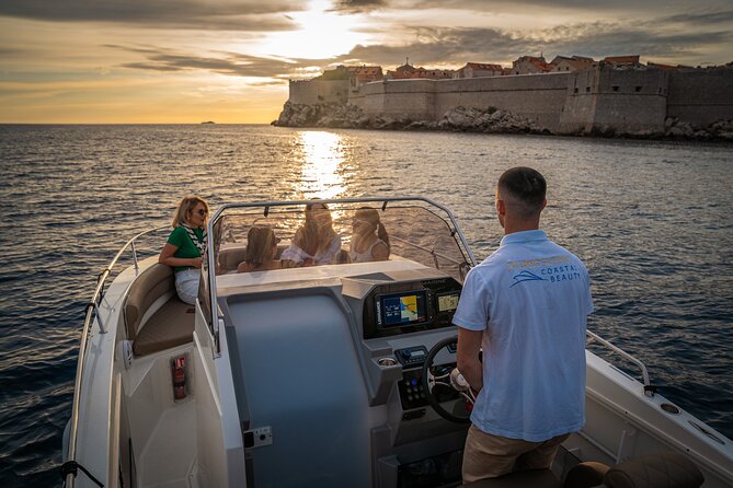 Dubrovnik Sunset Tour By Boat With Local - The sunset finale over the Adriatic, walls glowing in the last light