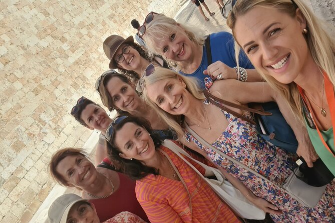 Explore Dubrovnik Old Town Walking Tour - Luza Square and the Sponza Palace, right in the power center