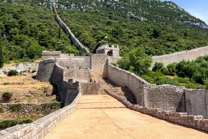 Explore Mostar, Ston and Kravice Waterfalls ( Small Group ) - Mostar and Stari Most: the bridge walk, the bazaar, and the layers
