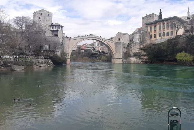 Full-Day Tour of Mostar and Kravica Waterfalls small group - Mostar’s Neretva River city time, with Old Bridge at the center