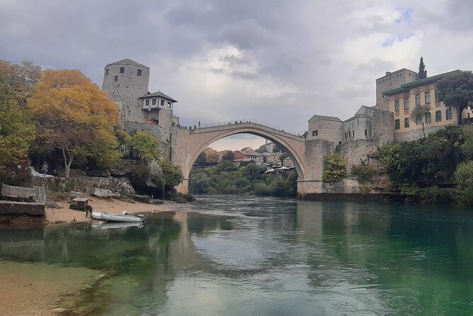 Private Day Tour to Mostar, Pocitelj and Kravica Waterfalls - Mostar Old Bridge area: free time for lunch, bazaar browsing, and bridge views