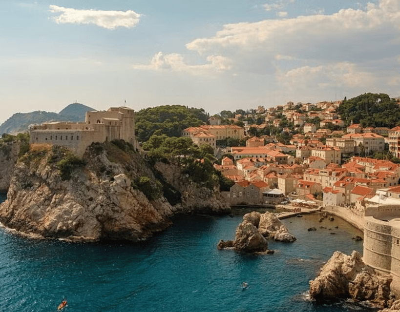 Sightseeing Boat Cruise in Old Town of Dubrovnik - Banje beach and coastline angles you can’t easily replicate on foot