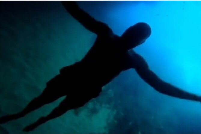 Speed Boat Tour to Elaphiti Caves and Sandy Beach from Dubrovnik - Stop 1 on Koločep: Blue Cave swimming and optional cliff jumping